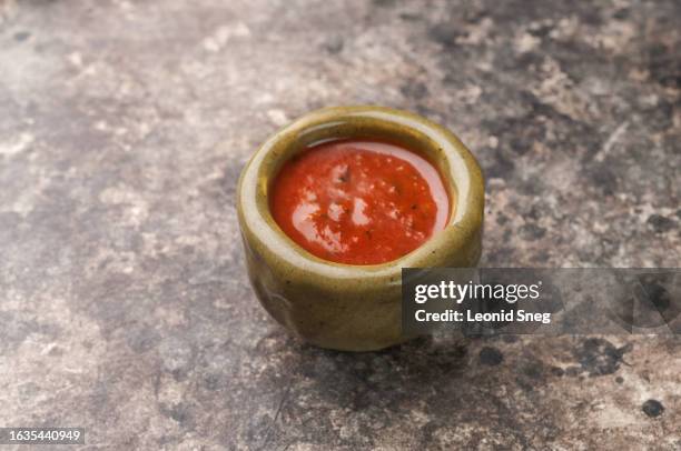 spicy tomato ketchup sauce on gray background - チャツネ ストックフォトと画像