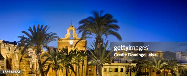 main facade of the cathedral of almería - monumento stock pictures, royalty-free photos & images