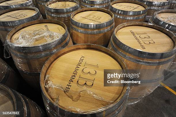 Brand new oak barrels stand at Treasury Wine Estates Ltd.'s Wolf Blass winery in the Barossa Valley, Australia, on Monday, March 4, 2013. Treasury,...
