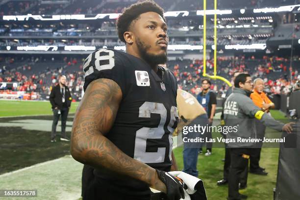 Raiders running back Josh Jacobs leaves the field after a loss to the Kansas City Chiefs in an NFL game at Allegiant Stadium on Jan. 7 in Las Vegas.