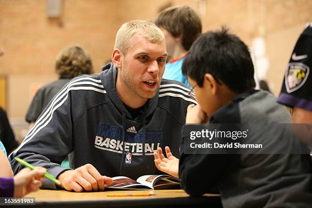 Greg Stiemsma of the Minnesota Timberwolves talks with students during a Reading Timeout as part of the Minnesota Timberwolves FastBreak Foundation's...