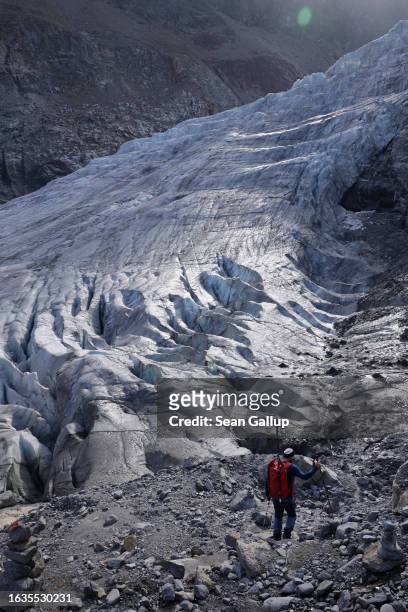 Martin Stocker-Waldhuber, a glaciologist with the Institute for Interdisciplinary Mountain Research of the Austrian Academy of Sciences, prepares to...