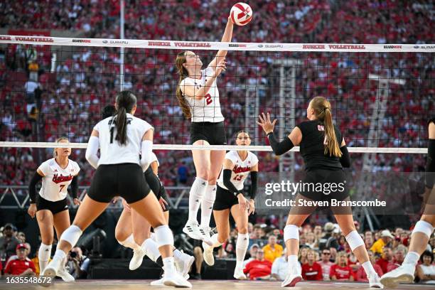 Bergen Reilly of the Nebraska Cornhuskers spikes the ball against the Omaha Mavericks at Memorial Stadium on August 30, 2023 in Lincoln, Nebraska.