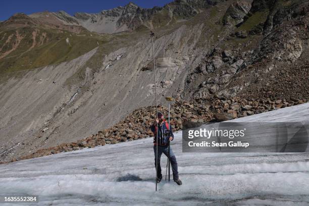Martin Stocker-Waldhuber, a glaciologist with the Institute for Interdisciplinary Mountain Research of the Austrian Academy of Sciences, holds a...