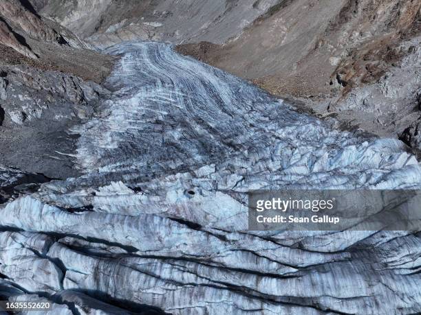 In this aerial view the tongue of the melting Gepatschferner glacier descends on August 22, 2023 above Kaunertal, Austria. Martin Stocker-Waldhuber,...