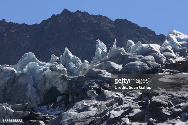 Ice formations protrude in a bend of the melting Gepatschferner glacier on August 22, 2023 above Kaunertal, Austria. Martin Stocker-Waldhuber, a...