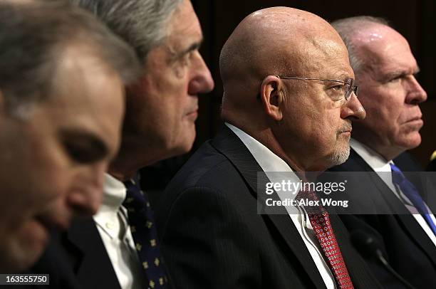 National Counterterrorism Center Director Matthew Olsen, FBI Director Robert Mueller, Director of National Intelligence James Clapper, and CIA...