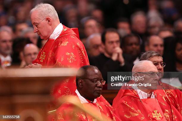 Canadian Cardinal Marc Ouellet attends the Pro Eligendo Romano Pontifice Mass at St Peter's Basilica, before they enter the conclave to decide who...