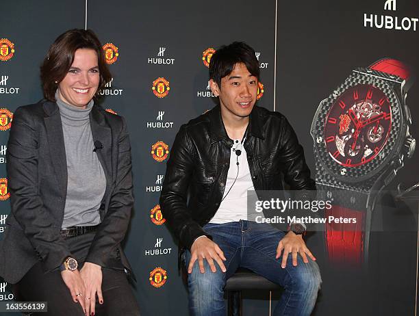 Hublot marketing director Valerie Servageon Grande and Shinji Kagawa of Manchester United take part in a press conference before taking part in a...