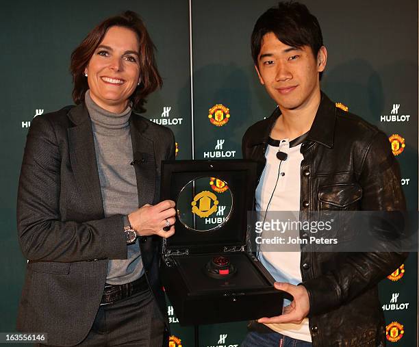 Hublot marketing director Valerie Servageon Grande and Shinji Kagawa of Manchester United take part in a press conference before taking part in a...