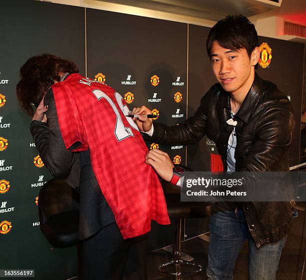 Hublot marketing director Valerie Servageon Grande and Shinji Kagawa of Manchester United take part in a press conference before taking part in a...