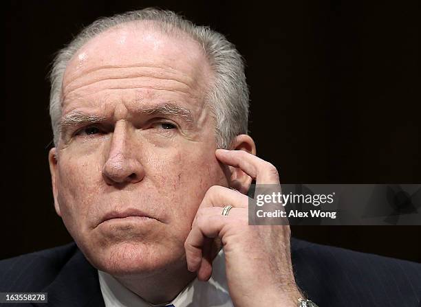 Director John Brennan testifies during a hearing before the Senate Intelligence Committee March 12, 2013 on Capitol Hill in Washington, DC. The...