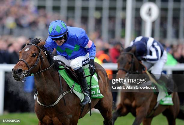 Ruby Walsh riding Hurricane Fly clear the last to win The Stan James Champion Hurdle Challenge Trophy during Champion Day at Cheltenham racecourse on...