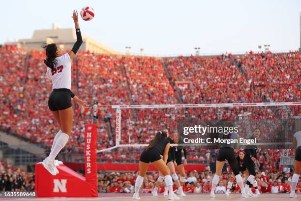 Harper Murray of the Nebraska Cornhuskers serves against the Omaha Mavericks at Memorial Stadium on August 30, 2023 in Lincoln, Nebraska.