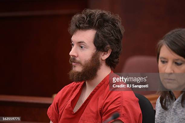 March 12, 2013: Aurora theater shooting suspect James Holmes with Defense attorney Tamara Brady in the courtroom during his arraignment Tuesday March...