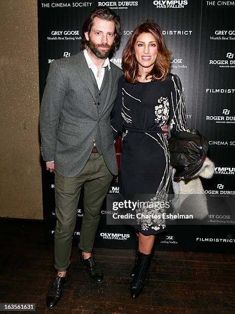 Model Louis Dowler and actress Jennifer Esposito attends The Cinema Society with Roger Dubuis and Grey Goose screening of FilmDistrict's "Olympus Has...