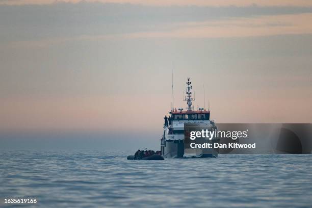 Bordcer force vessel arrives to collect around 50 migrants drifting into English waters after being accompanied by a French Warship from the French...