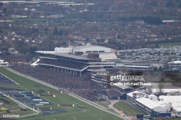 General view of the William Hill Supreme Novices' Hurdle Race from Cleeve Hill during Champion Day at Cheltenham Racecourse on March 12, 2013 in...