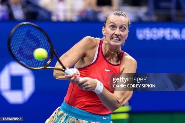 Czech Republic's Petra Kvitova plays a backhand return against Denmark's Caroline Wozniacki during the US Open tennis tournament women's singles...