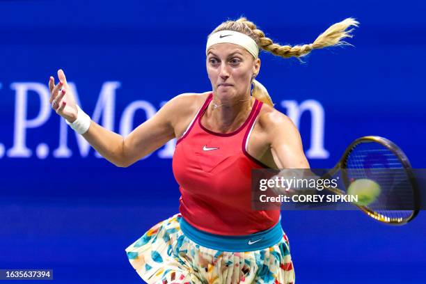 Czech Republic's Petra Kvitova plays a forehand return against Denmark's Caroline Wozniacki during the US Open tennis tournament women's singles...