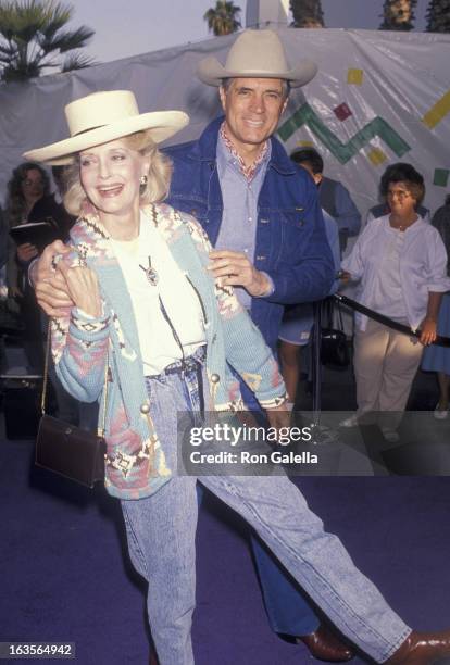 Actress Constance Towers and actor John Gavin attend 37th Annual SHARE Boomtown Party on May 19, 1990 at the Santa Monica Civic Auditorium in Santa...