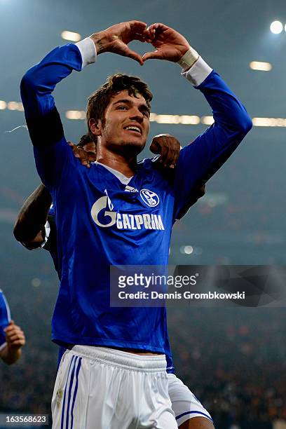 Roman Neustaedter of Schalke celebrates after scoring his team's first goal during the UEFA Champions League round of 16 second leg match between...