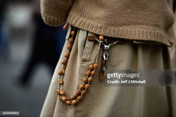 Pilgrims gather in St Peter's Square as cardinals attend mass before entering the conclave on March 12, 2013 in Vatican City, Vatican. Pope Benedict...