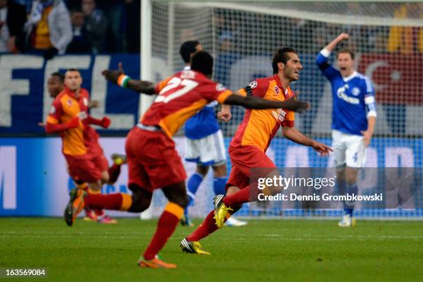 Hamit Altintop of Galatasaray celebrates after scoring his team's first goal during the UEFA Champions League round of 16 second leg match between...