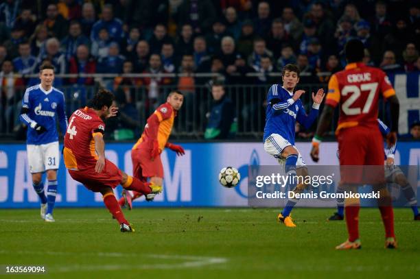 Hamit Altintop of Galatasaray scores his team's first goal during the UEFA Champions League round of 16 second leg match between Schalke 04 and...