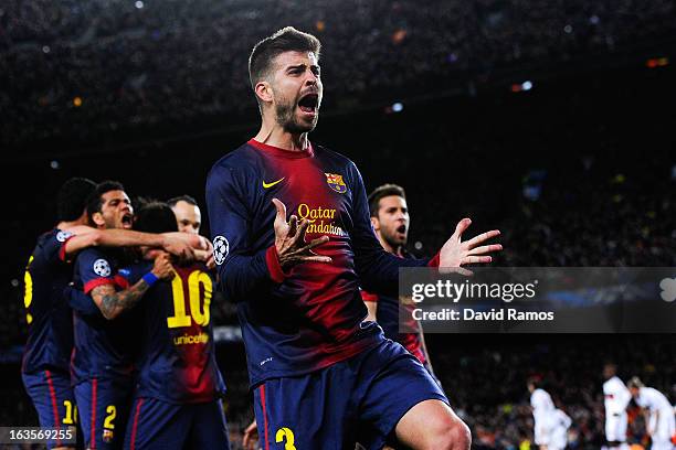 Gerard Pique of FC Barcelona celebrates after Lionel Messi of FC Barcelona scored his team's second goal during the UEFA Champions League round of 16...