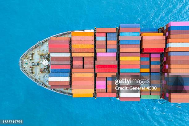 aerial top view container ship carrying container for import and export, business logistic and transportation. - shipping container top view - fotografias e filmes do acervo