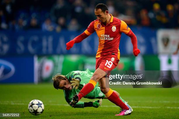 Umut Bulut of Galatasaray scores his team's third goal during the UEFA Champions League round of 16 second leg match between Schalke 04 and...