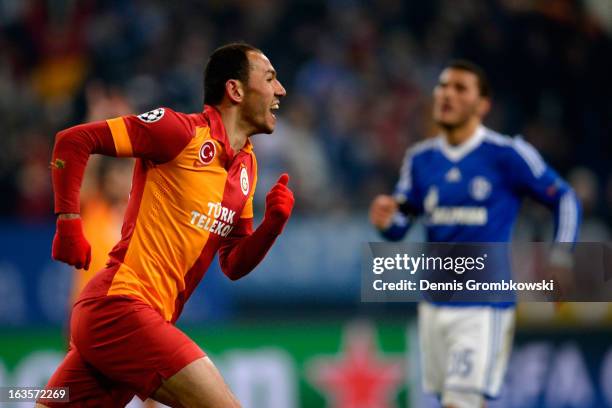 Umut Bulut of Galatasaray celebrates after scoring his team's third goal during the UEFA Champions League round of 16 second leg match between...