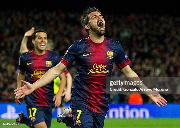 David Villa of FC Barcelona celebrates scoring their third goal during the UEFA Champions League Round of 16 second leg match between FC Barcelona...
