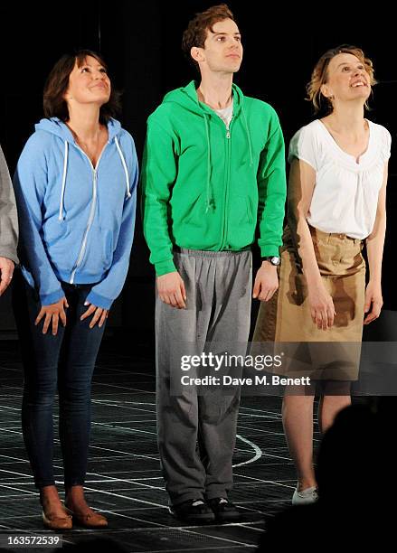 Cast member Holly Aird, Luke Treadaway and Niamh Cusack bow at the curtain call during the press night performance of 'The Curious Incident of the...