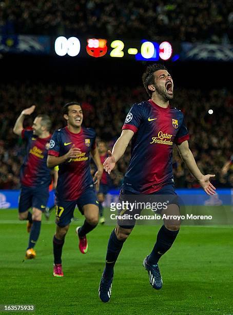 David Villa of FC Barcelona celebrates scoring their third goal during the UEFA Champions League Round of 16 second leg match between FC Barcelona...