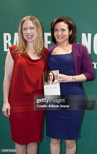 Chelsea Clinton, daughter of former U.S. President Bill Clinton and former Secretary of State Hillary Clinton, and Facebook COO Sheryl Sandberg, pose...