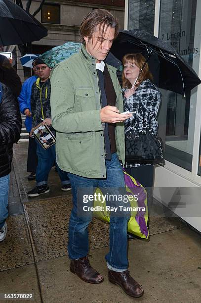 Actor Timothy Olyphant enters the "Live With Kelly And Michael" taping at the ABC Lincoln Center Studios on March 12, 2013 in New York City.