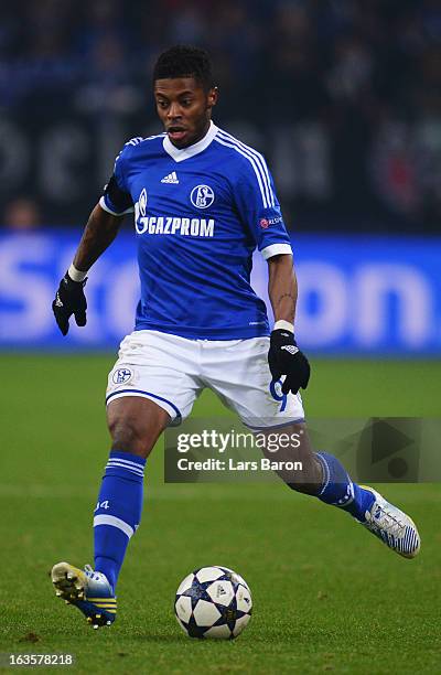 Michel Bastos of Schalke runs with the ball during the UEFA Champions League round of 16 second leg match between FC Schalke 04 and Galatasaray AS at...