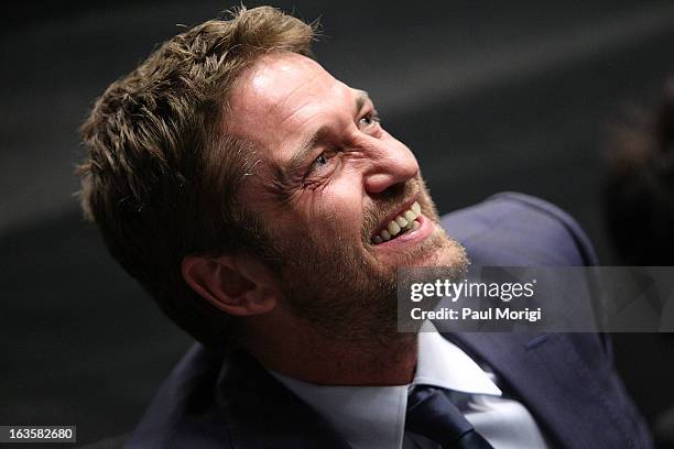 Actor Gerard Butler attends the "Olympus Has Fallen" screening Q & A at AMC Loews Georgetown 14 on March 12, 2013 in Washington, DC.