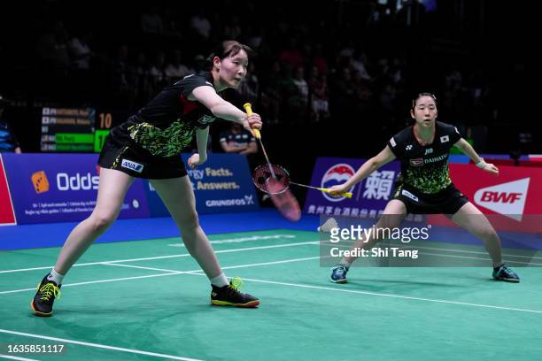 Mayu Matsumoto and Wakana Nagahara of Japan compete in the Women's Doubles Third Round match against Pearly Tan and Thinaah Muralitharan of Malaysia...