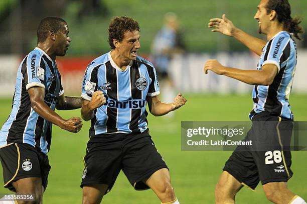 Elano Blumer of Gremio celebrates a goal during a match between Caracas FC and Gremio as part of the Copa Bridgestone Libertadores 2013 at Estadio...