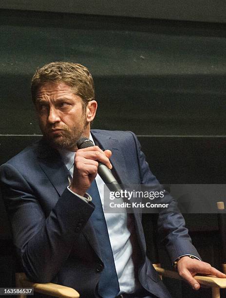 Gerard Butler speaks during the "Olympus Has Fallen" screening at AMC Loews Georgetown 14 on March 12, 2013 in Washington, DC.