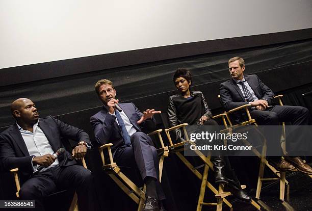 Antoine Fuqua, Gerard Butler, Angela Bassett and Aaron Eckhart speak during the "Olympus Has Fallen" screening at AMC Loews Georgetown 14 on March...