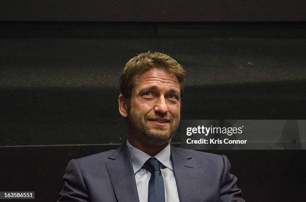 Gerard Butler speaks during the "Olympus Has Fallen" screening at AMC Loews Georgetown 14 on March 12, 2013 in Washington, DC.