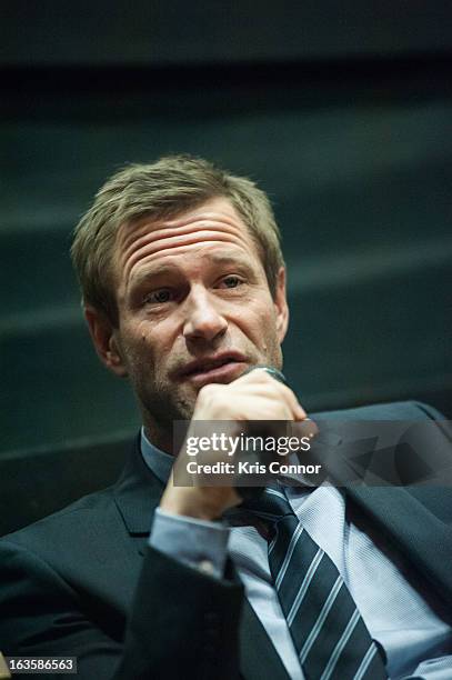 Aaron Eckhart speaks during the "Olympus Has Fallen" screening at AMC Loews Georgetown 14 on March 12, 2013 in Washington, DC.