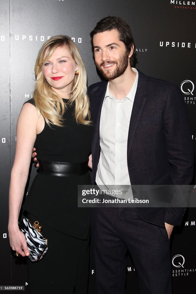 Kirsten Dunst and Jim Sturgess attend the "Upside Down" Los Angeles