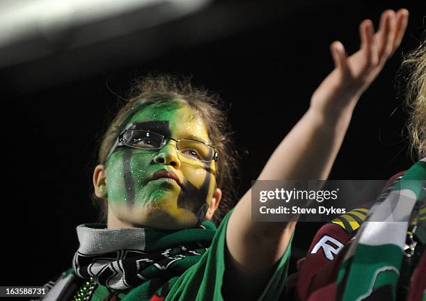 Member of the 'Timbers Army' celebrates after the Portland Timbers scored a goal during the second half of the game against the Montreal Impact at...