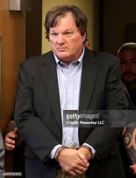 Accused Gilgo Beach killer Rex A. Heuermann appears before Judge Timothy P. Mazzei in Suffolk County Court in Riverhead, New York on August 1, 2023.