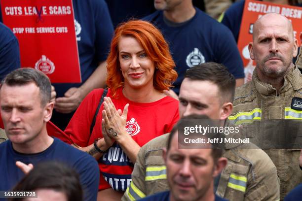 Fire fighters gather during a Fire Brigades Union’s demonstration in Glasgow’s George Square on August 24, 2023 in Glasgow, Scotland. The rally is...